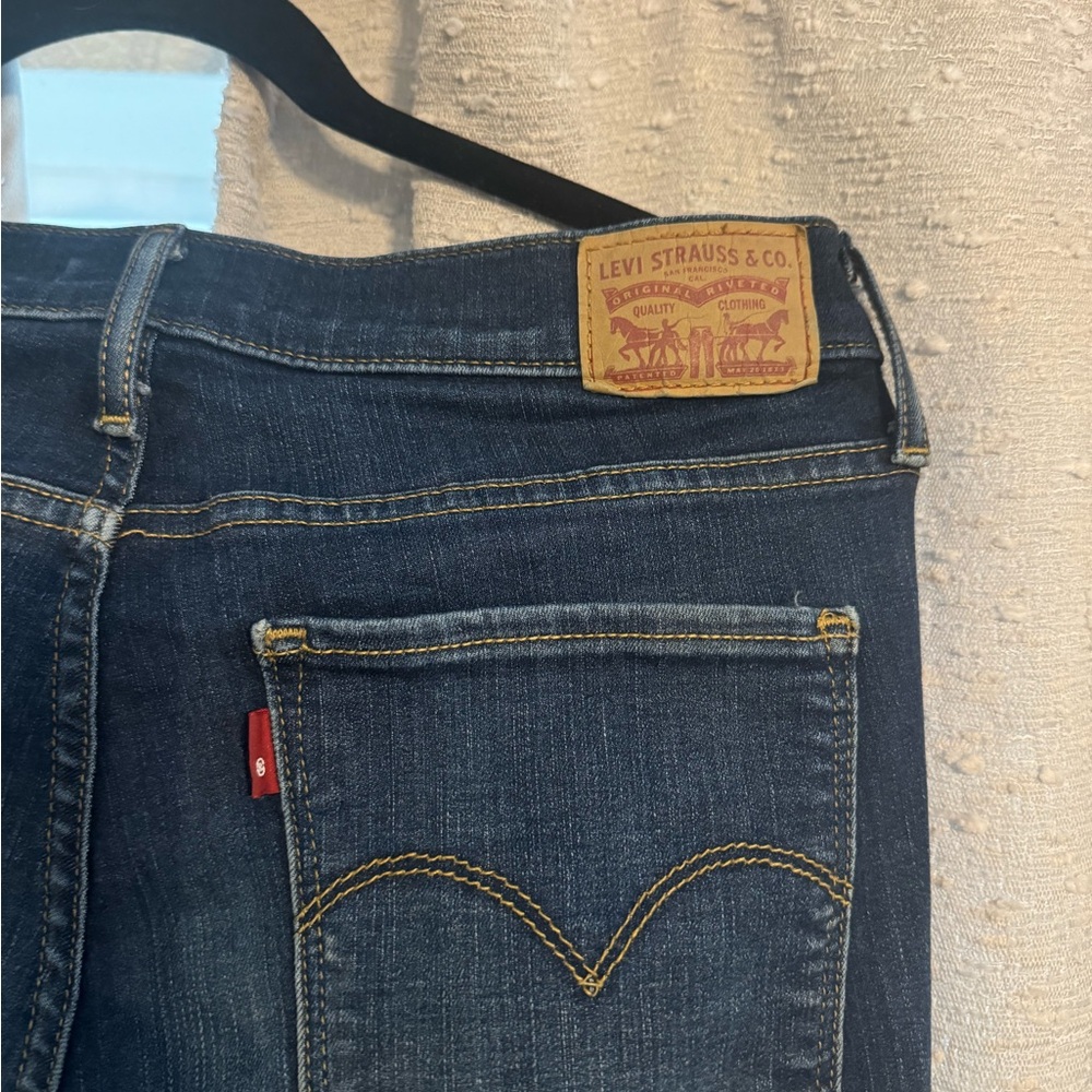 Levi’s dark wash super skinny jeans